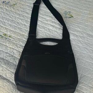 Tumi crossbody travel bag. Like new, used only a few times